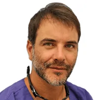 Dr. Paulo Pinho, founder of No Gap Dentists, providing affordable dental implants at Dental Implant Professionals.